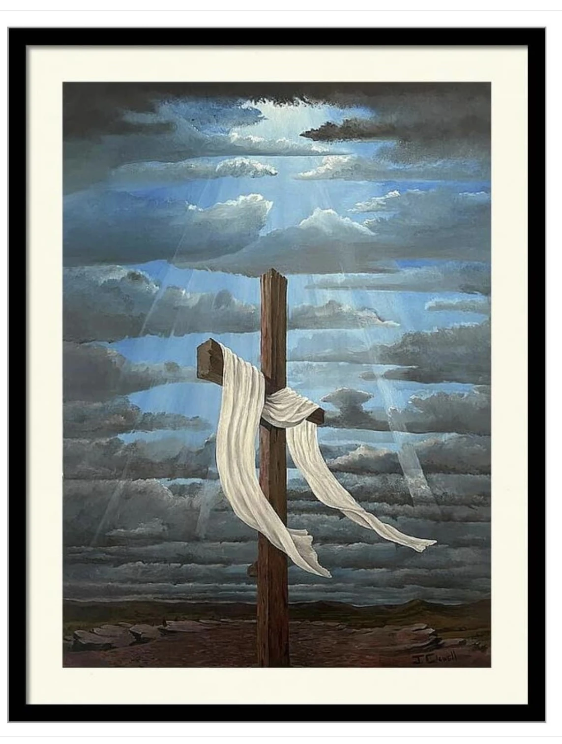 A pale scarf draped over a wooden cross beneath a dramatic blue sky